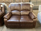 Brown Faux-Leather Reclining Loveseat