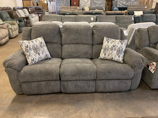 Gray Reclining Sofa with Accent Pillows