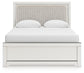Zuraleus Queen Upholstered Panel Bed, Dresser, Mirror and Nightstand