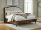 Sturlayne King Upholstered Panel Bed, Dresser, Mirror, Chest and Nightstand