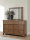 Chadworth California King Poster Bed with Mirrored Dresser and Nightstand