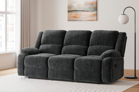 Signature Design by Ashley Draycoll Reclining Sofa - Vaughn Outlet Kankakee IL