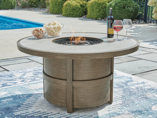 Signature Design by Ashley Rainier Ranch Round Fire Pit Table - Vaughn Outlet Kankakee IL